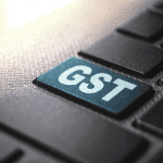 Keyboard with GST stamped on the return tab.